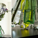Image for article titled This 3D-Printed Web of Plastic Caps Turns Water Bottles Into a Vase